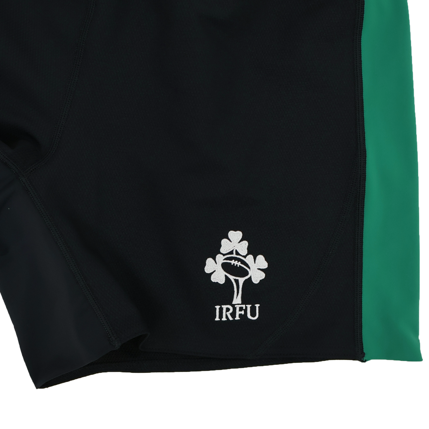 Close-up of the Canterbury Ireland 25/26 Alternate Match Short in black and green, featuring an embroidered IRFU rugby ball and shamrock logo—perfect for fans or players supporting Ireland.