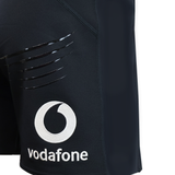 Close-up of the Ireland 25/26 Training Short by Canterbury in black, showing glossy claw mark designs and a white Vodafone logo with text on the left leg.
