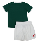 The Infant Ireland 25/26 Home Kit Pack by Canterbury features a green short-sleeve shirt with white trim and white shorts with a red Vodafone logo, inspired by the classic Ireland home kit.