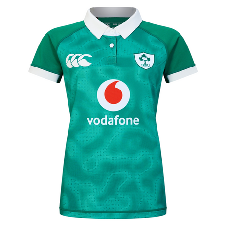 The Women's Ireland 25/26 Home Pro Jersey by Canterbury features a green short-sleeved design, white collar, IRFU logo, Canterbury branding, and Vodafone sponsor on the front.