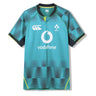 The Ireland 26 Pre Game Pro Jersey by Canterbury features a striking teal design with black and lime accents, showcasing the Vodafone sponsor logo, IRFU crest, and Canterbury branding on the front. Engineered with high-performance moisture-wicking technology for optimal comfort, this official Canterbury sports jersey is perfect as the Ireland Pre Game Pro Jersey.
