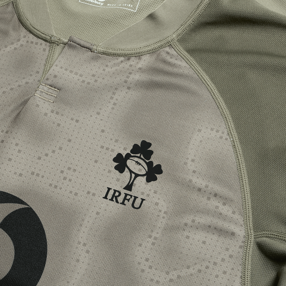 Close-up of the Ireland 25/26 Autumn Internationals Pro Training Jersey by Canterbury, showcasing the iconic IRFU logo on the chest—ideal for rugby fans supporting Ireland this season.