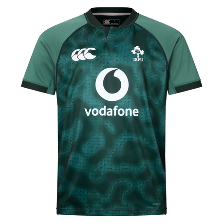 The Ireland 25/26 Six Nations Pro Training Jersey by Canterbury features black accents, Vapodri technology for comfort, the Canterbury logo, IRFU emblem, and Vodafone sponsor on the front.