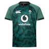 The Ireland 25/26 Six Nations Pro Training Jersey by Canterbury features black accents, Vapodri technology for comfort, the Canterbury logo, IRFU emblem, and Vodafone sponsor on the front.