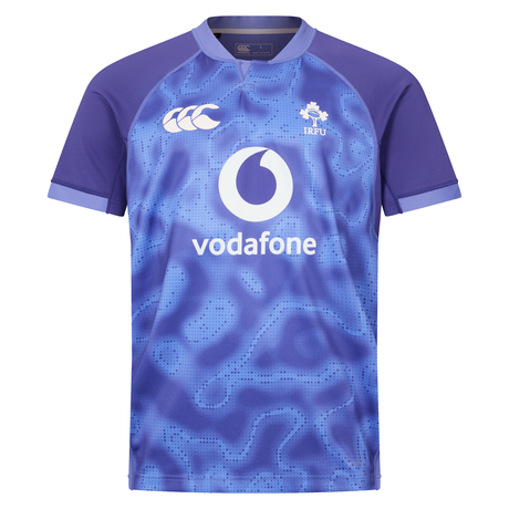 The Ireland 25/26 Six Nations Pro Training Jersey by Canterbury is a blue and purple short-sleeve top with Vodafone, IRFU, and Canterbury logos on the front.
