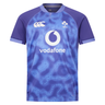 The Ireland 25/26 Six Nations Pro Training Jersey by Canterbury is a blue and purple short-sleeve top with Vodafone, IRFU, and Canterbury logos on the front.