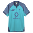 The Ireland 26/27 Summer Tour Training Pro Jersey by Canterbury features a turquoise and navy design, Vodafone logo, IRFU emblem, and Canterbury Pro Fit style on the chest.