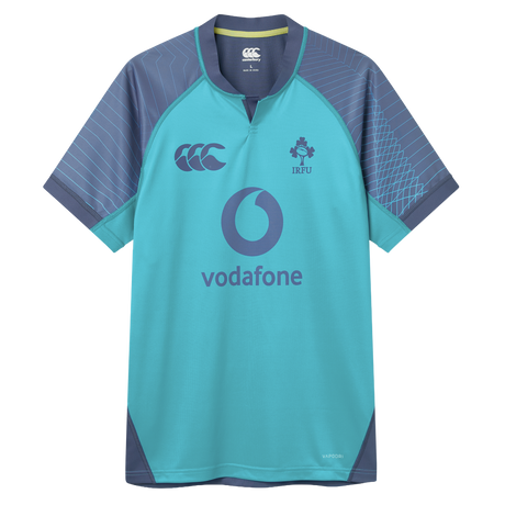 The Ireland 26/27 Summer Tour Training Pro Jersey by Canterbury features a turquoise and navy design, Vodafone logo, IRFU emblem, and Canterbury Pro Fit style on the chest.