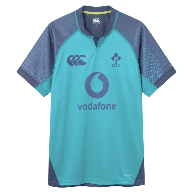 The Ireland 26/27 Summer Tour Training Pro Jersey by Canterbury features a turquoise and navy design, Vodafone logo, IRFU emblem, and Canterbury Pro Fit style on the chest.