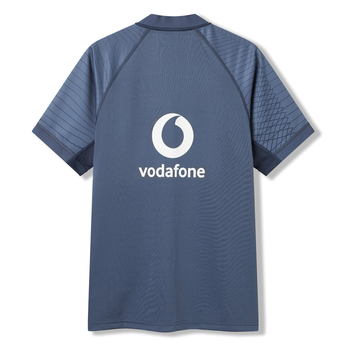 Back view of the Canterbury Ireland 26 Training Pro Jersey, a short-sleeve dark blue rugby jersey showcasing subtle geometric patterns on the shoulders and a prominent Vodafone logo. Crafted in Canterbury’s signature Training Jersey style, it features advanced VapoDri technology for enhanced comfort.