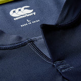Close-up of the Ireland 26 Training Pro Jersey by Canterbury in blue, featuring the Canterbury brand logo, size label, “Made in China” text, and intricate stitching details near the collar and neckline, echoing the design of an authentic Ireland Rugby shirt.