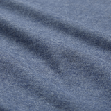 Close-up of blue heather fabric from the Ireland 26/27 Summer Tour Team Cotton T-Shirt by Canterbury, highlighting its texture and gentle horizontal folds—ideal for the season's rugby excitement.