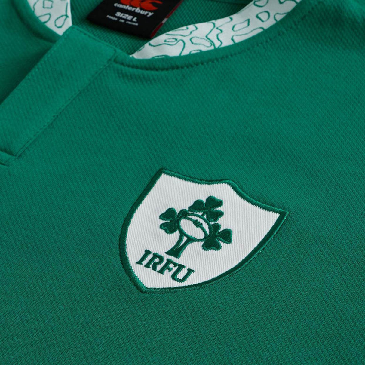 Close-up of the Ireland WRWC25 Classic Jersey by Canterbury, a home jersey featuring the IRFU crest with a bold shamrock emblem.