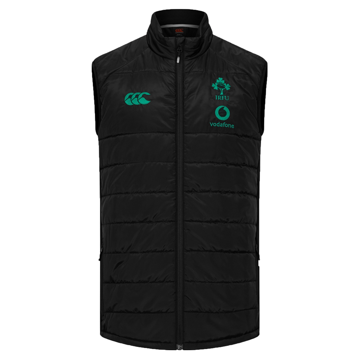 The Ireland 25/26 Elite Gilet by Canterbury is a black sleeveless puffer vest with a front zipper and green IRFU, Vodafone, and Canterbury logos on the chest. This official fan item is part of the Elite Gilet collection.