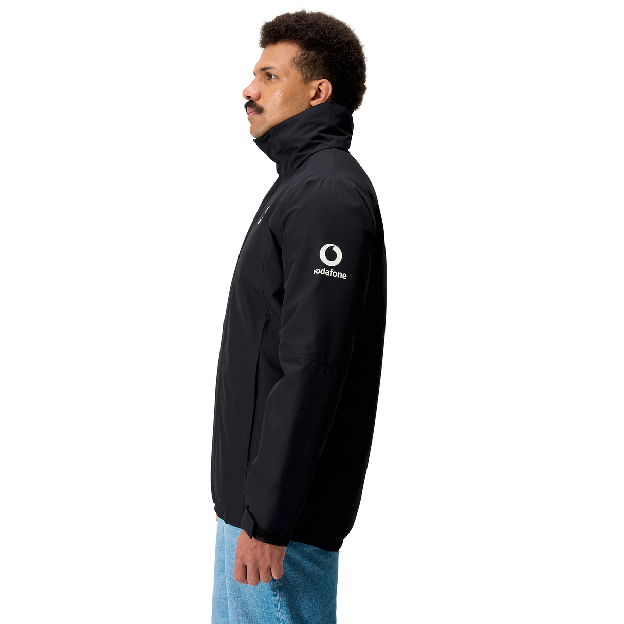 A person in profile wears the Canterbury Ireland 25/26 Water Resistant Insulated Jacket, featuring a "vodafone" logo on the sleeve, against a white background.