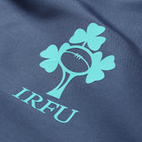 Close-up of the Irish Rugby Football Union (IRFU) logo, featuring a rugby ball and three shamrocks, printed on dark fabric—highlighting the quality craftsmanship of the Ireland 26 Legends 1/4 Zip Jacket by Canterbury.