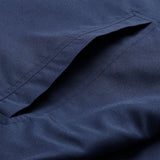 Close-up of the Ireland 26 Legends 1/4 Zip Jacket by Canterbury in navy blue, highlighting a single welt pocket with neat stitching.