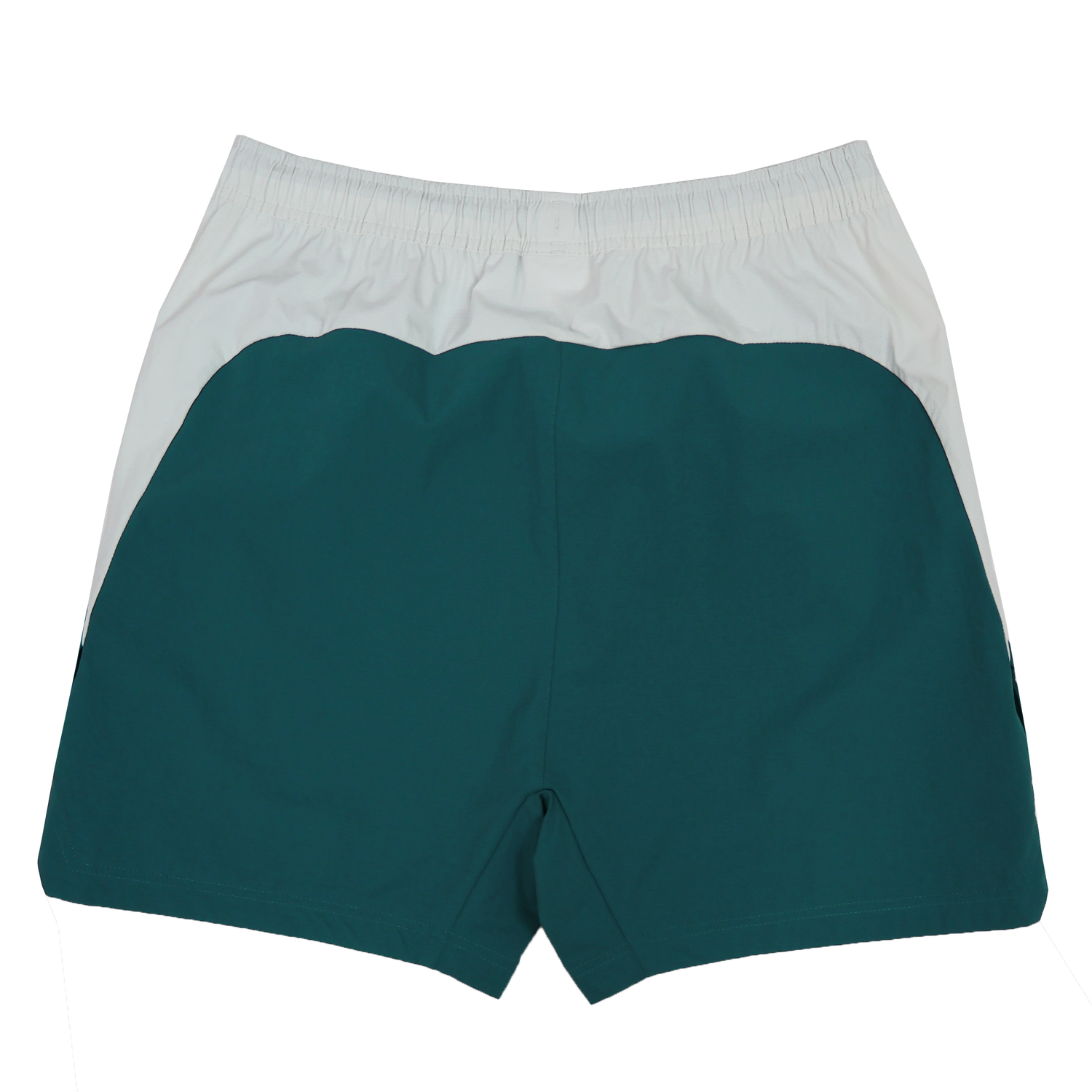 The Canterbury Tempo+Woven 5" Short features a white waistband and upper section with a teal lower section, shown flat with the back side up. These men's athletic shorts by Canterbury are comfortable and breathable—ideal for workouts.