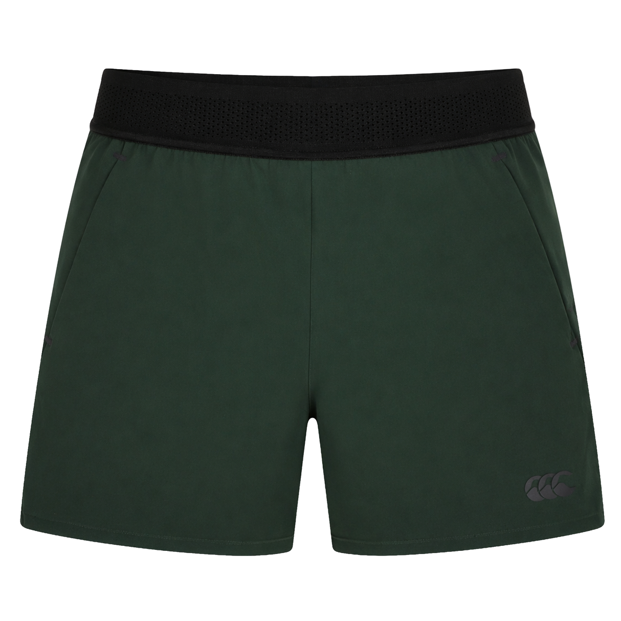 Canterbury Everest Woven Short 5" in dark green features a black elastic waistband, side pockets, and four-way stretch fabric for comfort and mobility, shown on a plain white background.
