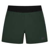 Canterbury Everest Woven Short 5" in dark green features a black elastic waistband, side pockets, and four-way stretch fabric for comfort and mobility, shown on a plain white background.