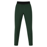 The Canterbury Everest Woven Pant 30" in dark green features a black elastic waistband, sweat-wicking fabric, and four-way stretch for comfort, shown on a white background.