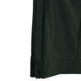 Close-up of the lower edge of a dark green Canterbury Everest Woven Pant 30" by Canterbury, highlighting the black zipper along the side seam and four-way stretch fabric, set against a white background.