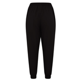 The Canterbury Women's Ireland 25/26 Training Pant features black athletic styling with an elastic waistband and cuffs, inspired by official Ireland gear, shown against a white background.
