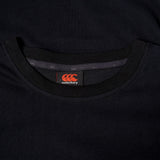 Close-up of a black Canterbury FUN. T-SHIRT AM featuring the brand label on the inside collar.