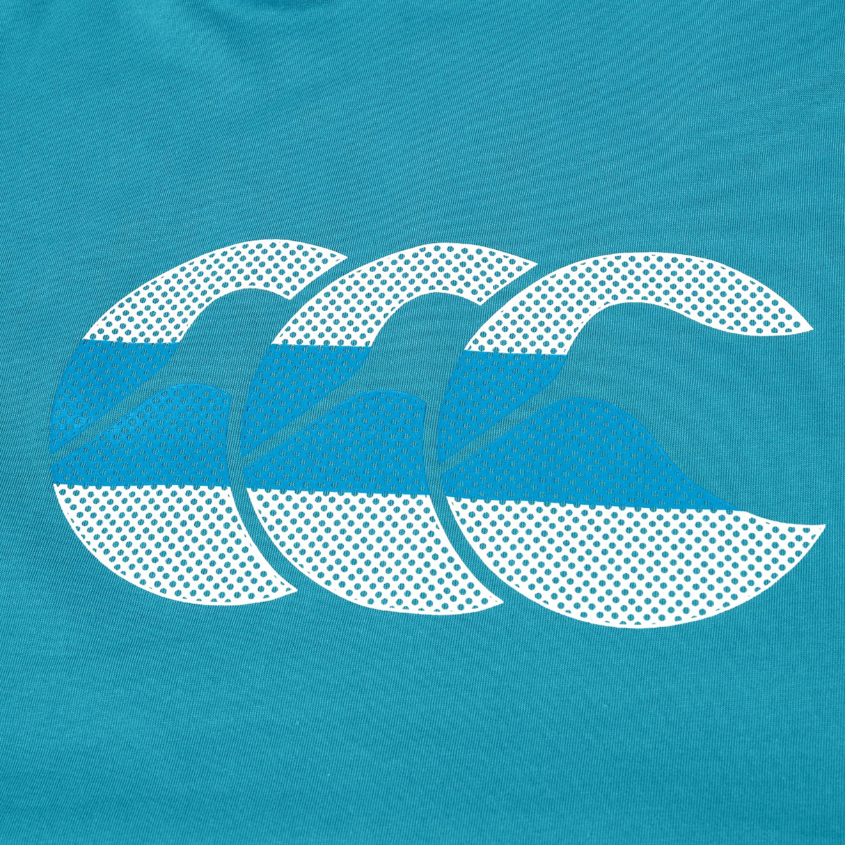 The Canterbury FUN. T-SHIRT AM features three stylized blue and white wave shapes with dotted patterns on a teal background—a playful, Canterbury-inspired design perfect for any fun occasion.