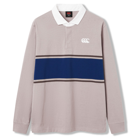 The Canterbury Stripe Classic Rugby Jersey by Canterbury is a long-sleeve, light gray rugby shirt with a white collar, navy horizontal stripe, and white chest logo, crafted from a durable cotton blend for comfort and style.