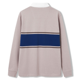 The Canterbury Stripe Rugby Jersey features long sleeves, a white collar, and a horizontal navy blue stripe bordered by thin black lines on the back. It’s crafted from a durable cotton blend in light beige.