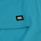 Close-up of the Canterbury Uglies Logo T-shirt, a teal cotton blend tee with a small black rectangular Canterbury patch displaying the white logo and text.