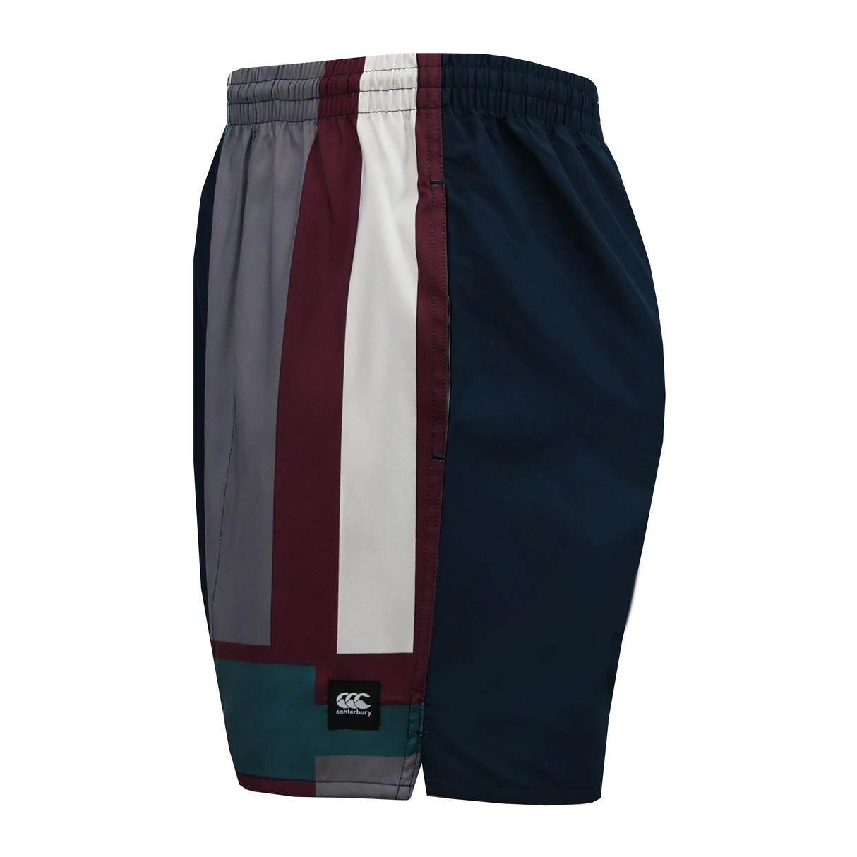 Side view of Canterbury Uglies Harletic Short rugby shorts by Canterbury, featuring an elastic waistband, geometric pattern in dark blue, gray, maroon, white and teal, plus a small black logo patch near the hem.