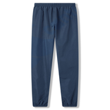 The Uglies 32" Stadium Pant by Canterbury features a navy blue design with an elastic waistband and cuffs, making them ideal performance athletic pants. Displayed against a white background.