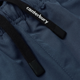 Close-up of Canterbury's Uglies 32" Stadium Pant in navy with black drawstrings and the white "canterbury" logo—ideal for rugby fans.
