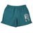 The Canterbury Women's Canterbury Uglies Tactic Short features a teal design with an elastic waistband and a stylized leaf graphic on the left leg, made from high-performance polyester for comfortable training.