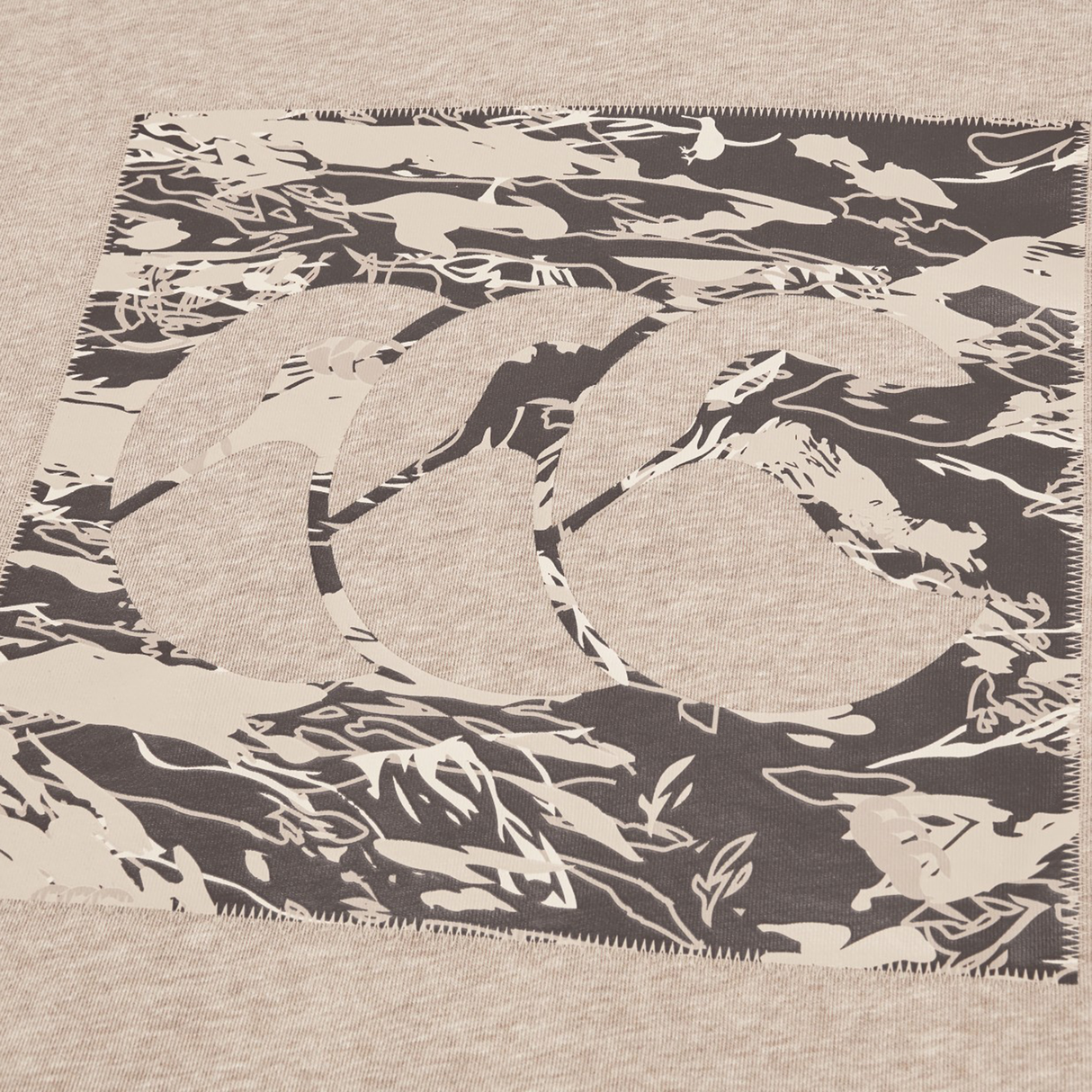 The Canterbury FORCE HOODIE features a beige and brown camouflage rectangular patch with three overlapping stylized "C" shapes on a light beige fabric background.