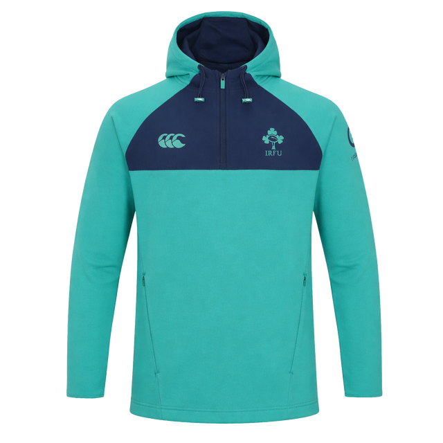The Ireland 26/27 Summer Tour Training Hoodie by Canterbury features zippered pockets, the Canterbury logo, the IRFU crest, a sleeve logo, and moisture-wicking fabric to keep you comfortable and stylish.
