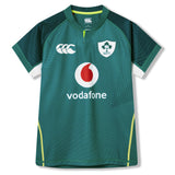 Ireland 26 Home Test Jersey by Canterbury—an authentic green short-sleeve rugby jersey featuring the Ireland badge, Vodafone sponsor logo, and distinctive white and yellow accents on the sleeves and sides.
