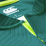 Close-up of the Ireland 26 Home Test Jersey by Canterbury in green, highlighting the collar, stitching details, and Canterbury logo with “Made in China” text—a classic design inspired by traditional Ireland Test Jerseys.