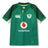 The Ireland 26 Home Pro Jersey by Canterbury showcases bold white, green, and yellow accents and features the iconic IRFU crest, the Vodafone sponsor logo, and the Canterbury brand logo prominently on the front.