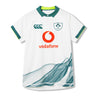 Ireland 26 Alternate Pro Jersey by Canterbury: A white short-sleeved rugby jersey featuring green accents, IRFU and sponsor logos, and a wave pattern near the bottom.