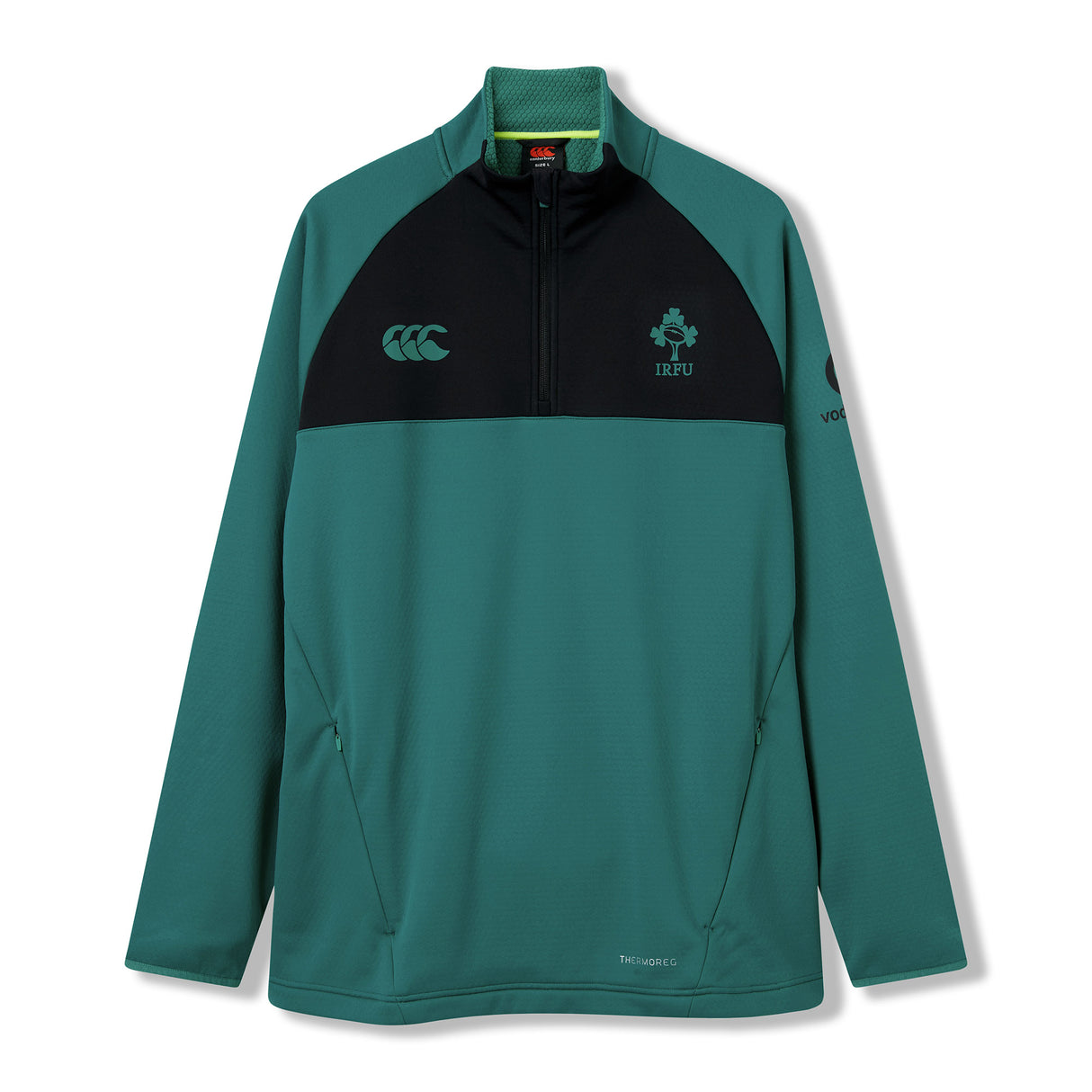 The Ireland 26 1/4 Zip Training Top by Canterbury is a green and black long-sleeve pullover featuring Thermoreg technology, convenient zip pockets, official Ireland rugby and Canterbury logos, and classic quarter-zip styling.