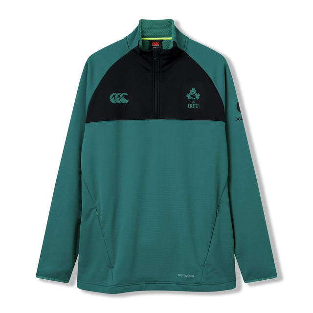 The Ireland 26 1/4 Zip Training Top by Canterbury is a green and black long-sleeve pullover featuring Thermoreg technology, convenient zip pockets, official Ireland rugby and Canterbury logos, and classic quarter-zip styling.