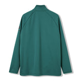 A long-sleeved, green Ireland 26 1/4 Zip Training Top by Canterbury is displayed laid flat with the back facing up against a white background. This rugby training top features Thermoreg technology from Canterbury to help regulate your body temperature during intense sessions.