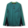 The Ireland 26 LS Superlight Training T-shirt by Canterbury features long sleeves, a green and black athletic design with geometric line patterns, IRFU and CCC logos on the front, and dark side panels. This Canterbury shirt offers a superlight construction for performance and comfort during intense training sessions.