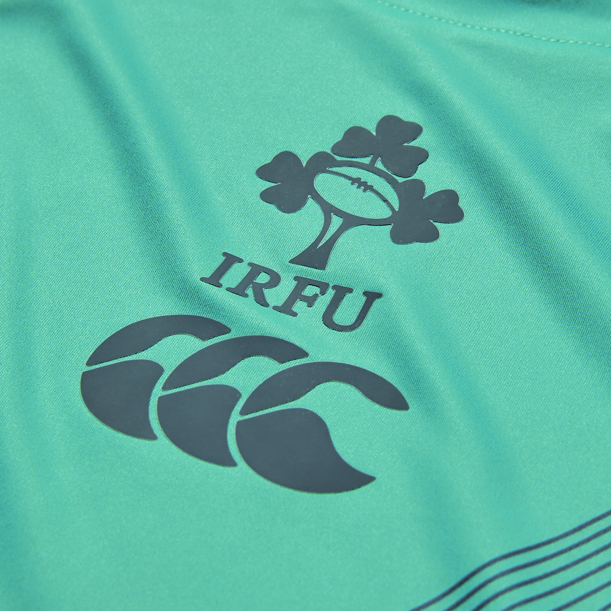 Close-up of the Ireland 26/27 Summer Tour Superlight Training Tank by Canterbury, featuring the IRFU logo above the Canterbury brand—ideal for fans seeking an official lightweight Ireland training tank.