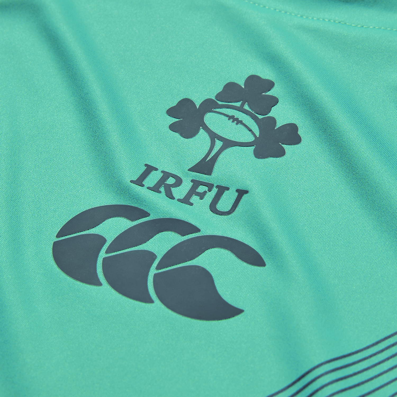 Close-up of the Ireland 26/27 Summer Tour Superlight Training Tank by Canterbury, featuring the IRFU logo above the Canterbury brand—ideal for fans seeking an official lightweight Ireland training tank.