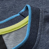 Close-up of the collar on the Women’s Ireland 26 Cotton T-shirt by Canterbury, highlighting the blue and yellow trim, fine stitching, and fabric texture—a perfect detail shot for fans of this Canterbury rugby tee.