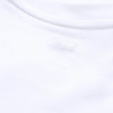 Close-up of the Canterbury Tempo+ GFX Training Tank’s white collar and neckline, featuring a subtle, tagless printed label inside the fabric—ideal for those seeking lightweight workout comfort or dependable Canterbury training wear.
